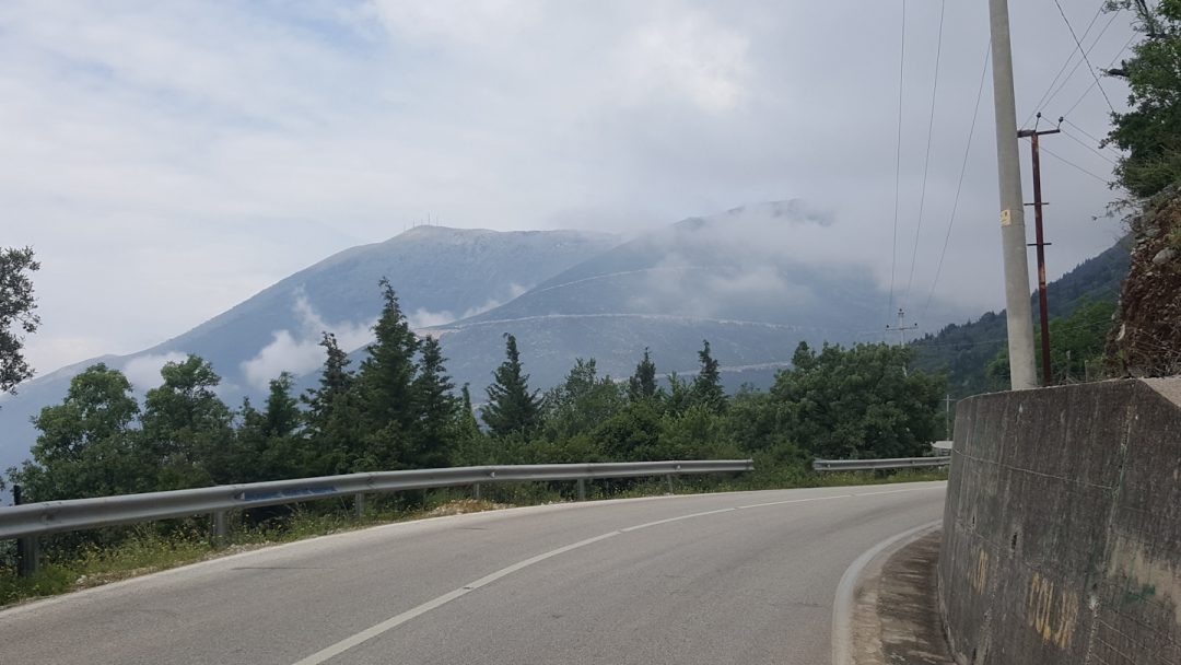 The Llogara Pass looms in the mist